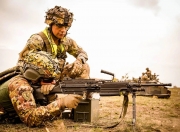 爱游戏官方登录入口-意大利射击选手准确命中目标